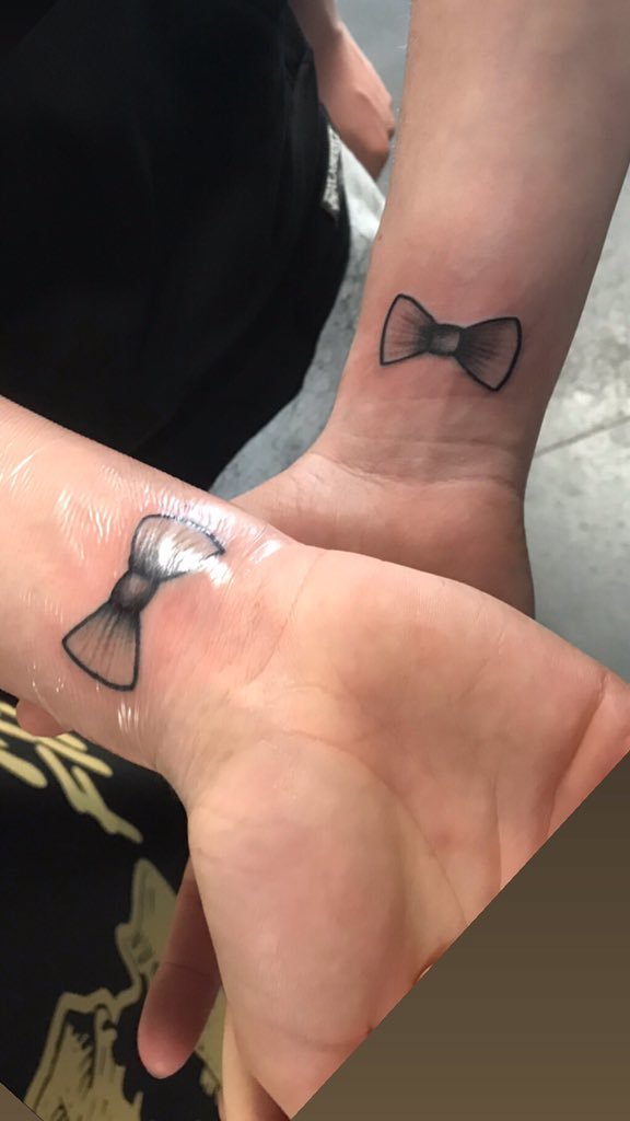 Hundreds turn up to get bow tie tattoos in support of 10-year-old brain haemorrhage survivor Joey the Legend